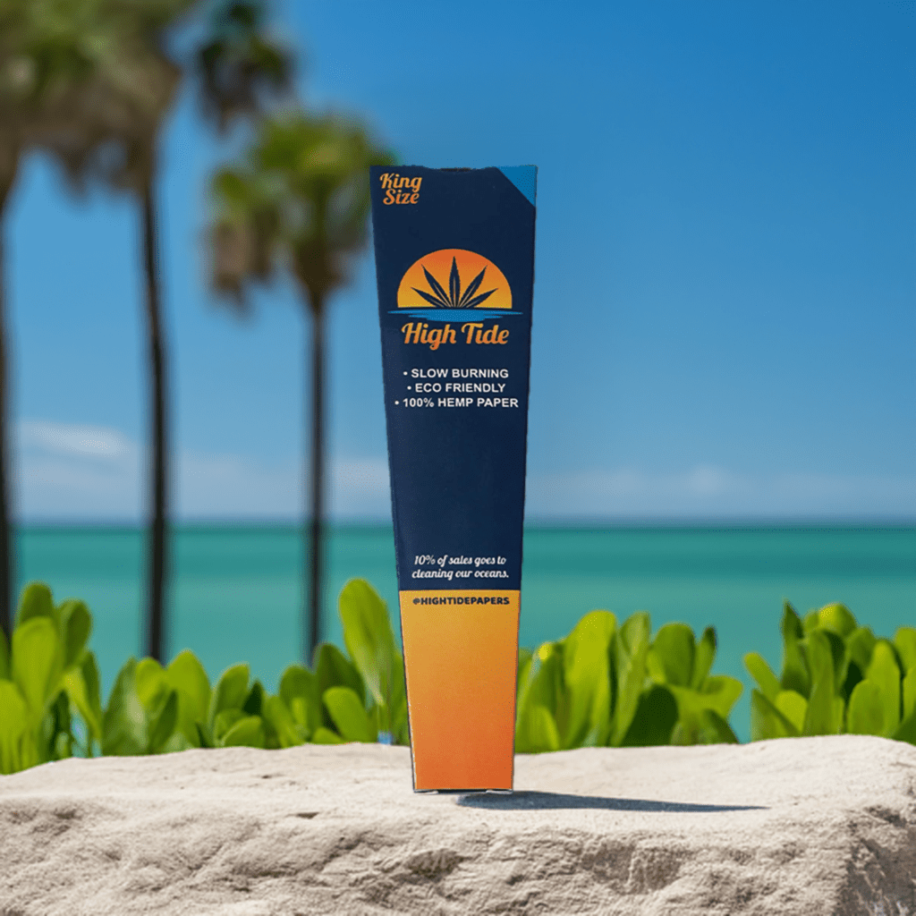 High Tide organic natural hemp paper cones, standing on a rock with an island backdrop