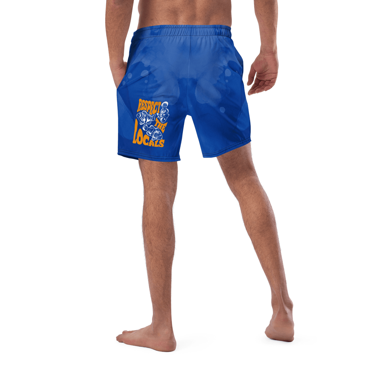 High Tide's recycled swim trunks worn by a model showing the back with graphic that says Respect the Locals