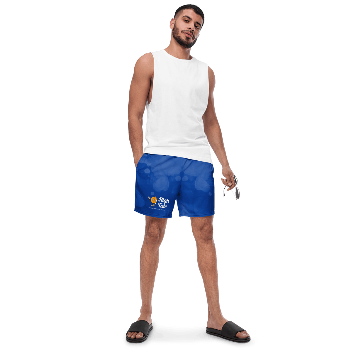 Model wearing High Tide recycled swim trunks showing front of Respect the Locals design which has High Tide's smoking orange and the text "High Tide, all natural hemp papers"